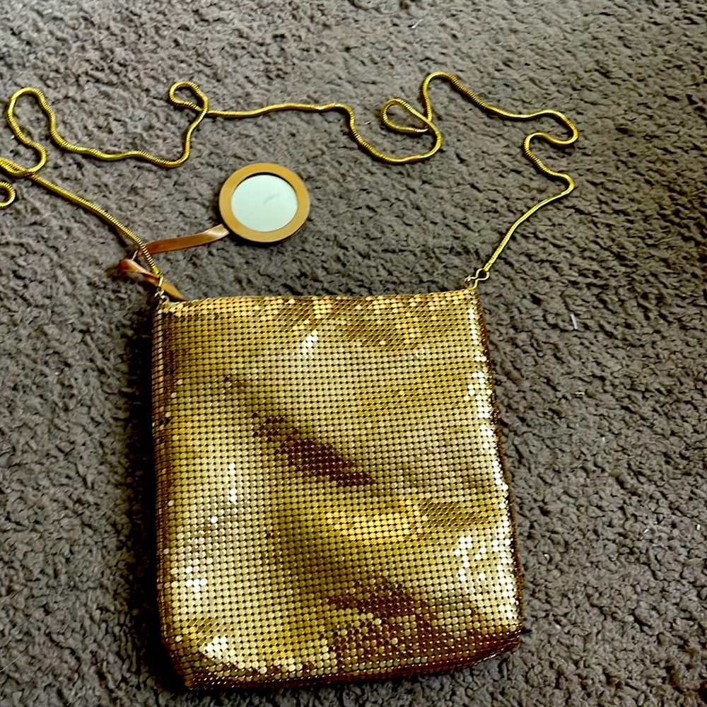 Cute sequence over the shoulder bag comes with a little mirror